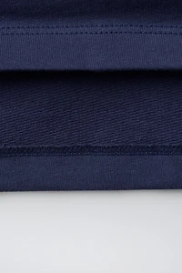POLO EN MAILLE À RAYURES ET BRODERIES