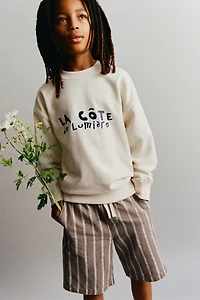STRIPED COTTON AND LINEN SHORTS