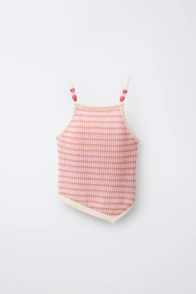 TOP EN MAILLE ASYMÉTRIQUE À RAYURES