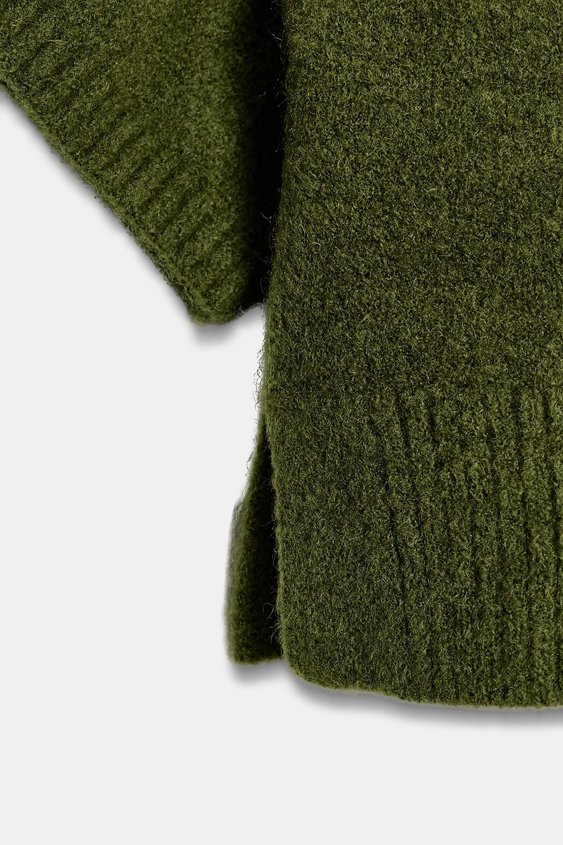 SHORT SLEEVE KNIT SWEATER