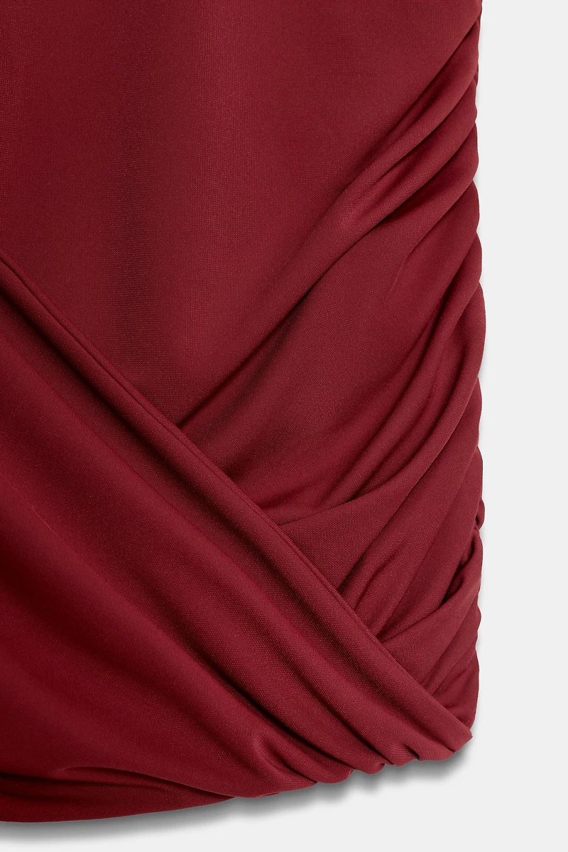 DRAPED SHOULDER PAD DRESS