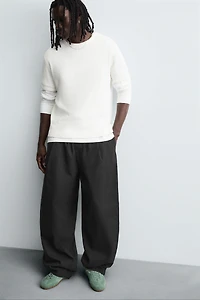 BALLOON FIT PLEATED PANTS