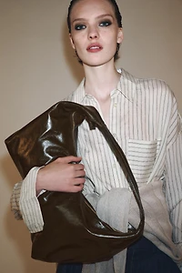LEATHER OVAL BAG