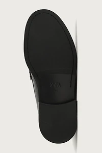 MOCASSINS EN CUIR À MASQUE