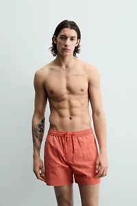 TEXTURED SWIMSUIT
