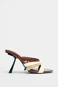 ASYMMETRIC HEELED SANDALS