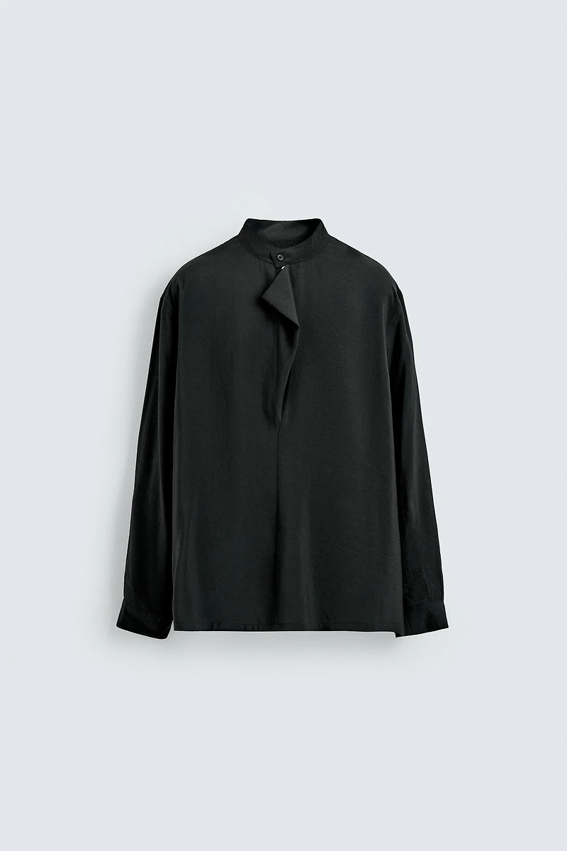 FLOWY POLO SHIRT