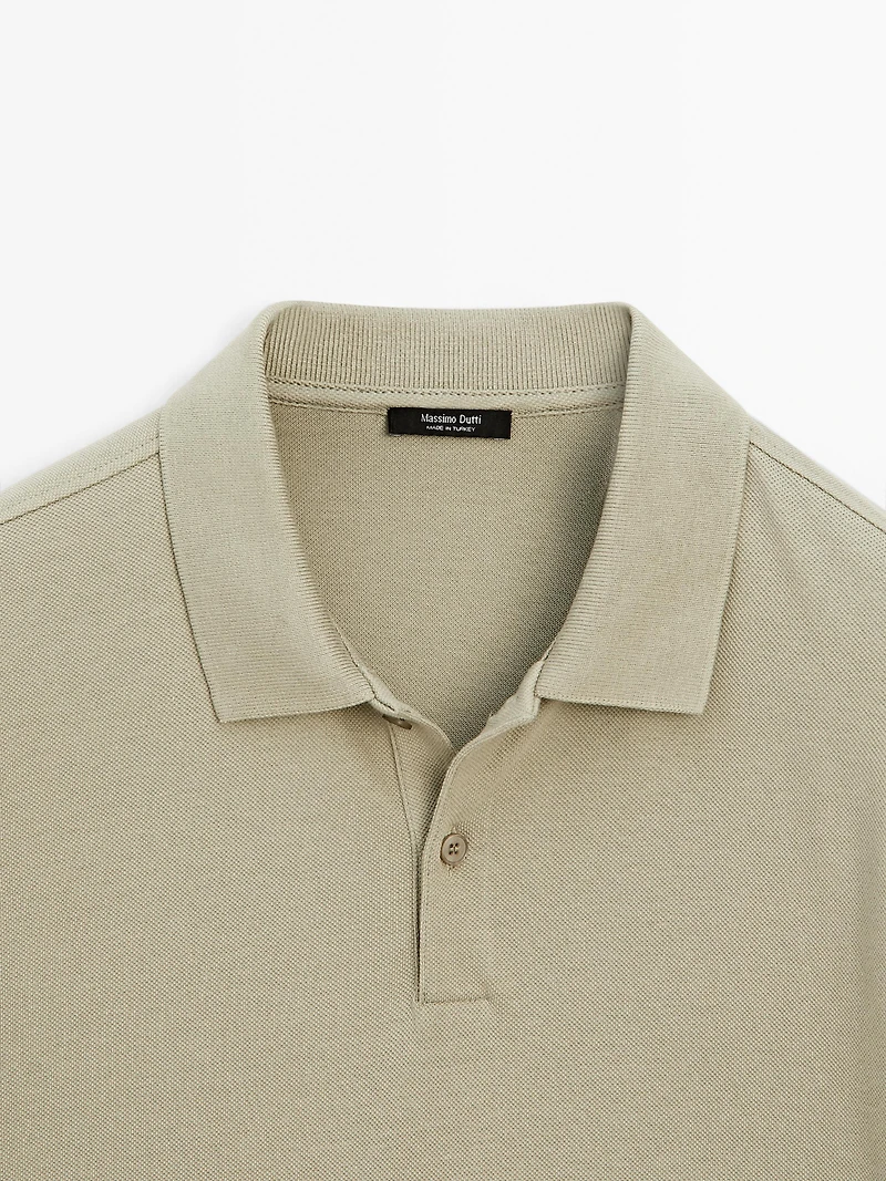 Polo micro-texture en piqué de coton
