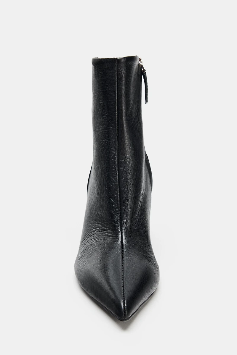 BOTTINES À TALONS EN CUIR