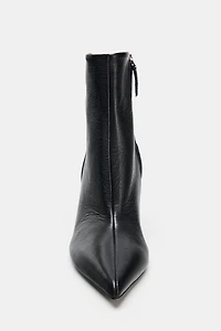 BOTTINES À TALONS EN CUIR
