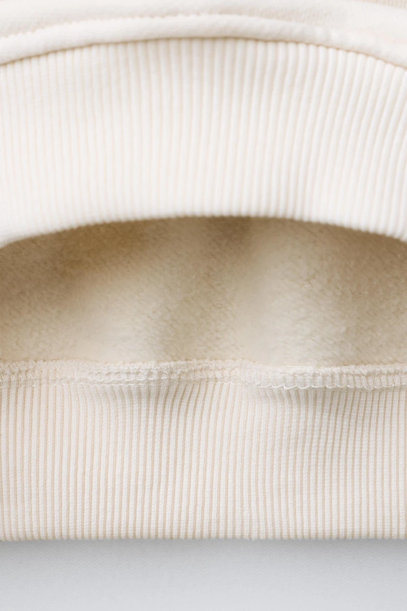 EMBROIDERED DUCK POLO SWEATSHIRT