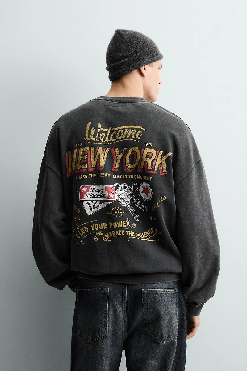 WASHED PRINTED TEXT SWEATSHIRT