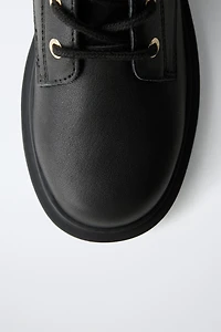 LEATHER ANKLE BOOTS WITH BUCKLE