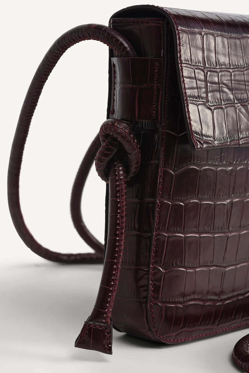 LIMITED EDITION EMBOSSED LEATHER CROSSBODY BAG