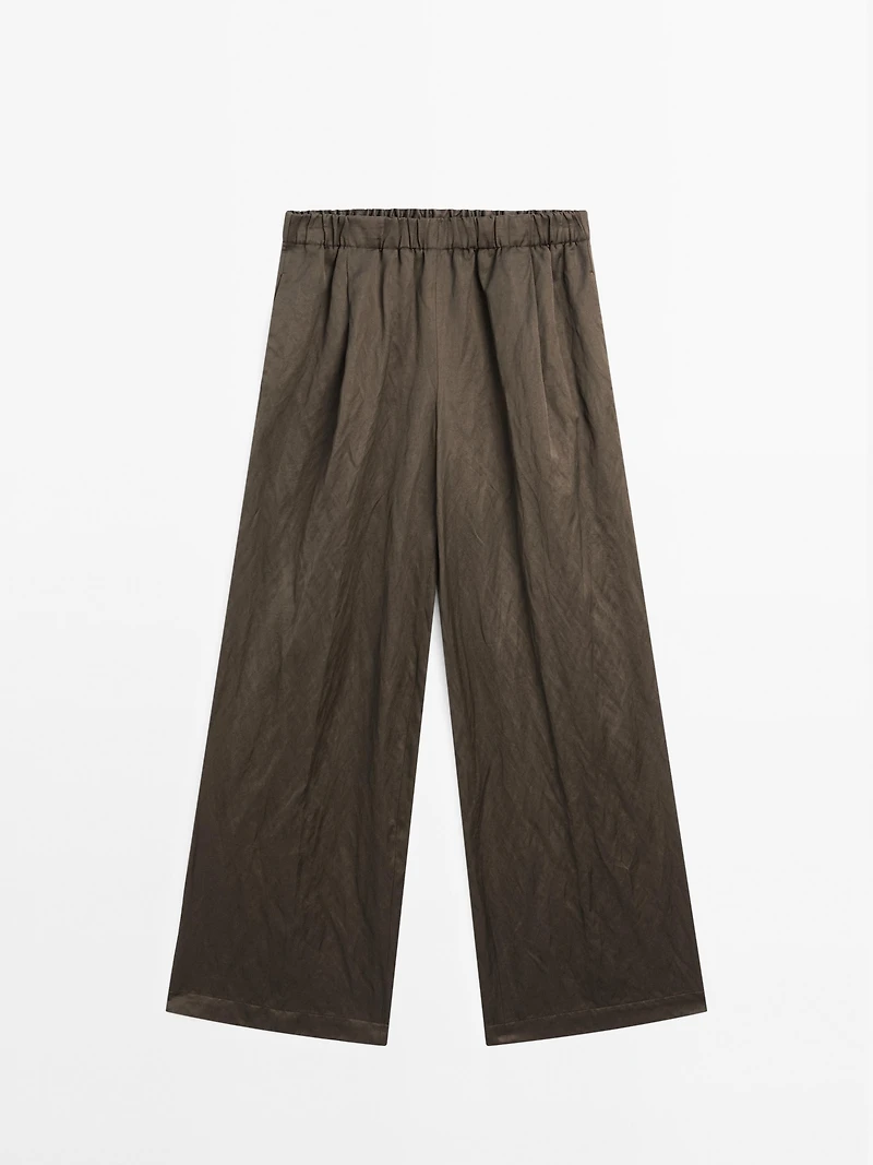 Wide-leg satin trousers with creased effect