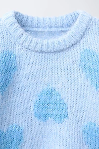 PULL EN MAILLE À COEURS