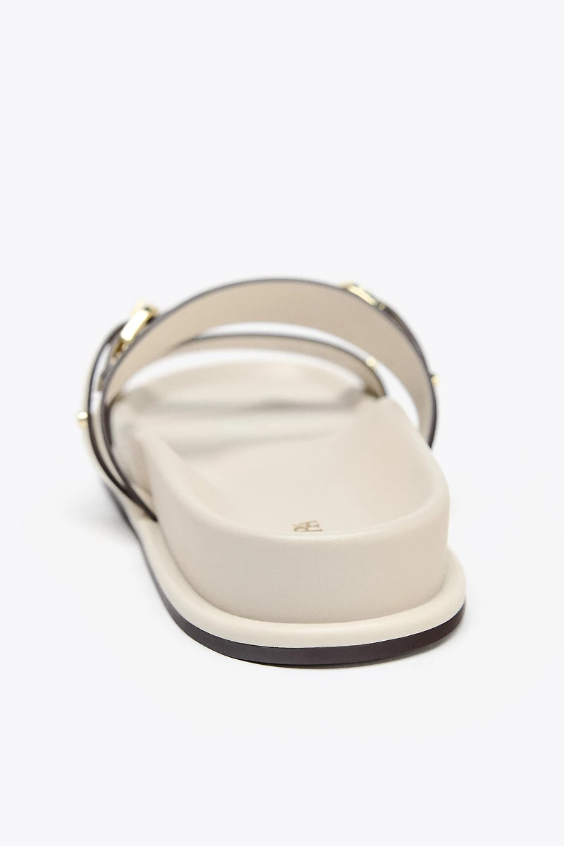 FLAT BUCKLED SANDALS