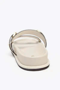 FLAT BUCKLED SANDALS