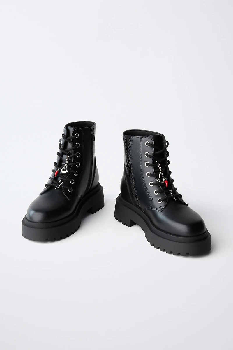 LACED ANKLE BOOTS WITH CHARMS