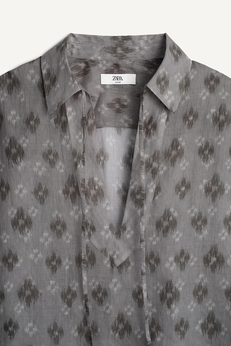 100% RAMIE BOXY FIT POLO SHIRT