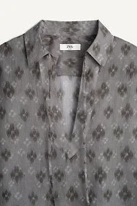 100% RAMIE BOXY FIT POLO SHIRT