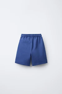 BERMUDA SPORTY POCHES