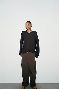 TOP EN MAILLE AJOURÉ