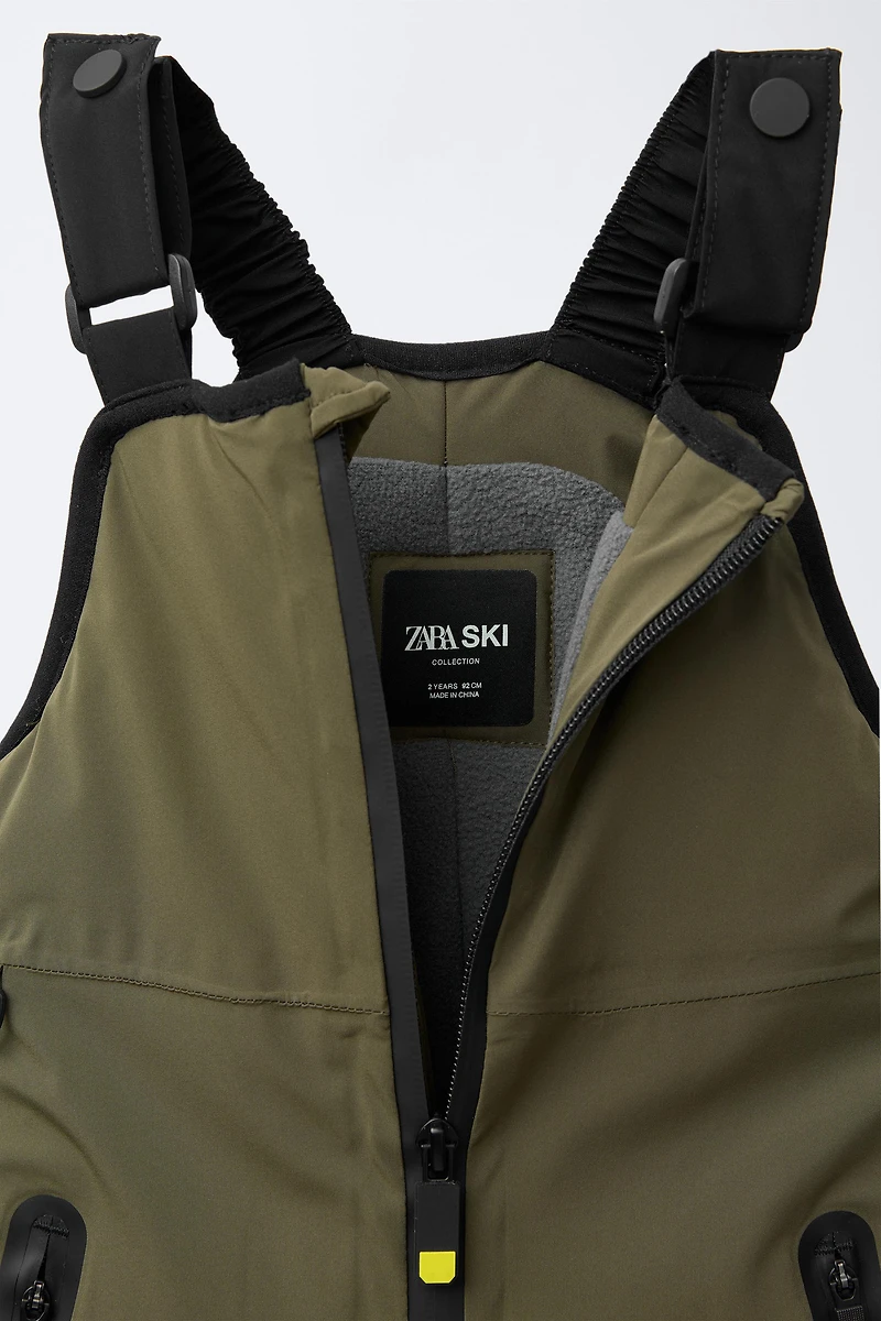 WATERPROOF AND WINDPROOF BIB OVERALLS WITH POCKETS RECCO® SYSTEM SKI COLLECTION