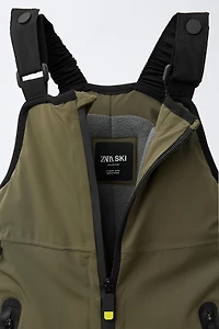WATERPROOF AND WINDPROOF BIB OVERALLS WITH POCKETS RECCO® SYSTEM SKI COLLECTION