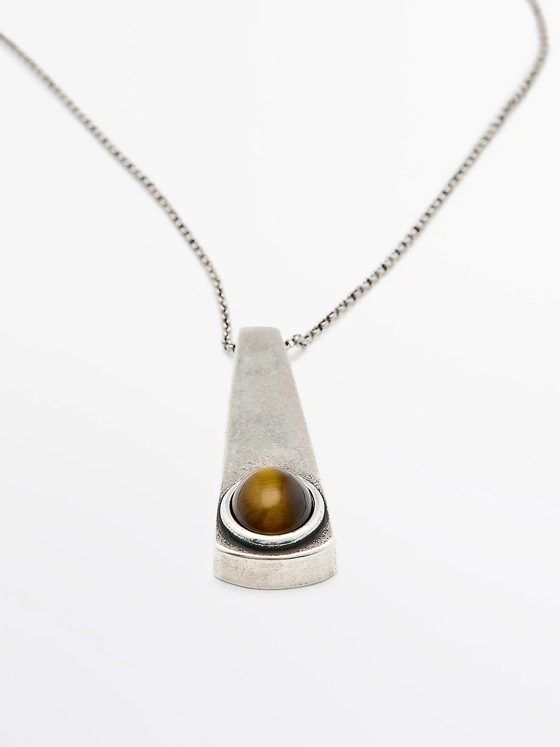 Geometric pendant with stone