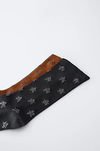 LOT DE DEUX CHAUSSETTES LONGUES ÉTOILES BRILLANTES