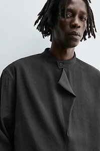 FLOWY POLO SHIRT