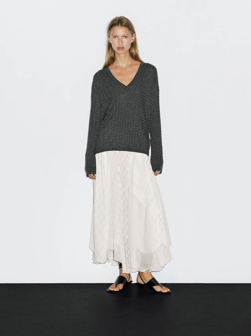 V-neck cable-knit sweater