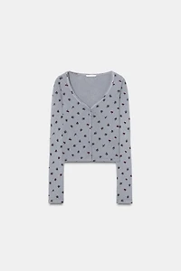 VESTE POINTELLE À FLEURS