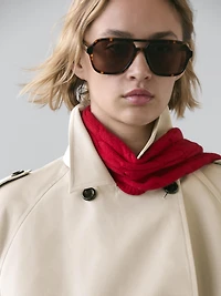 Short trench coat with belt detail
