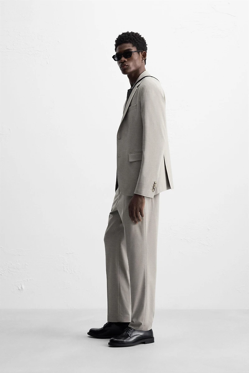 TEXTURED SUIT PANTS