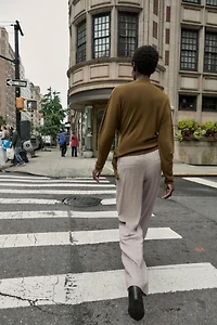 ASYMMETRIC KNIT SWEATER
