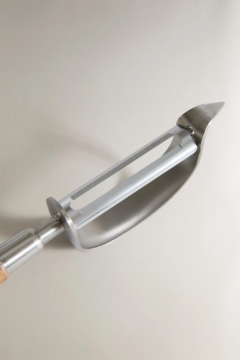 STEEL AND ACACIA PEELER