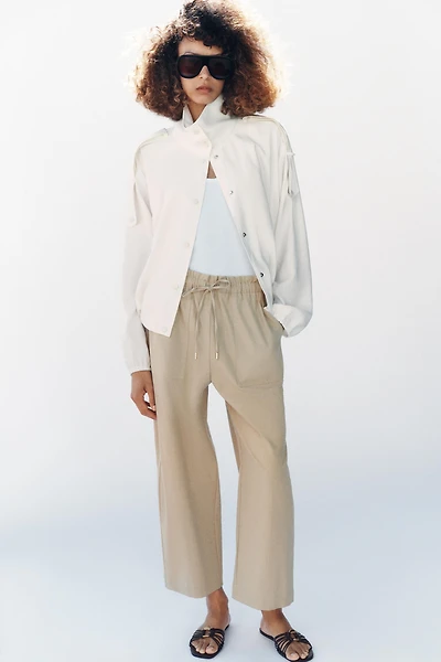 PANTALON TAPERED À TAILLE ÉLASTIQUE