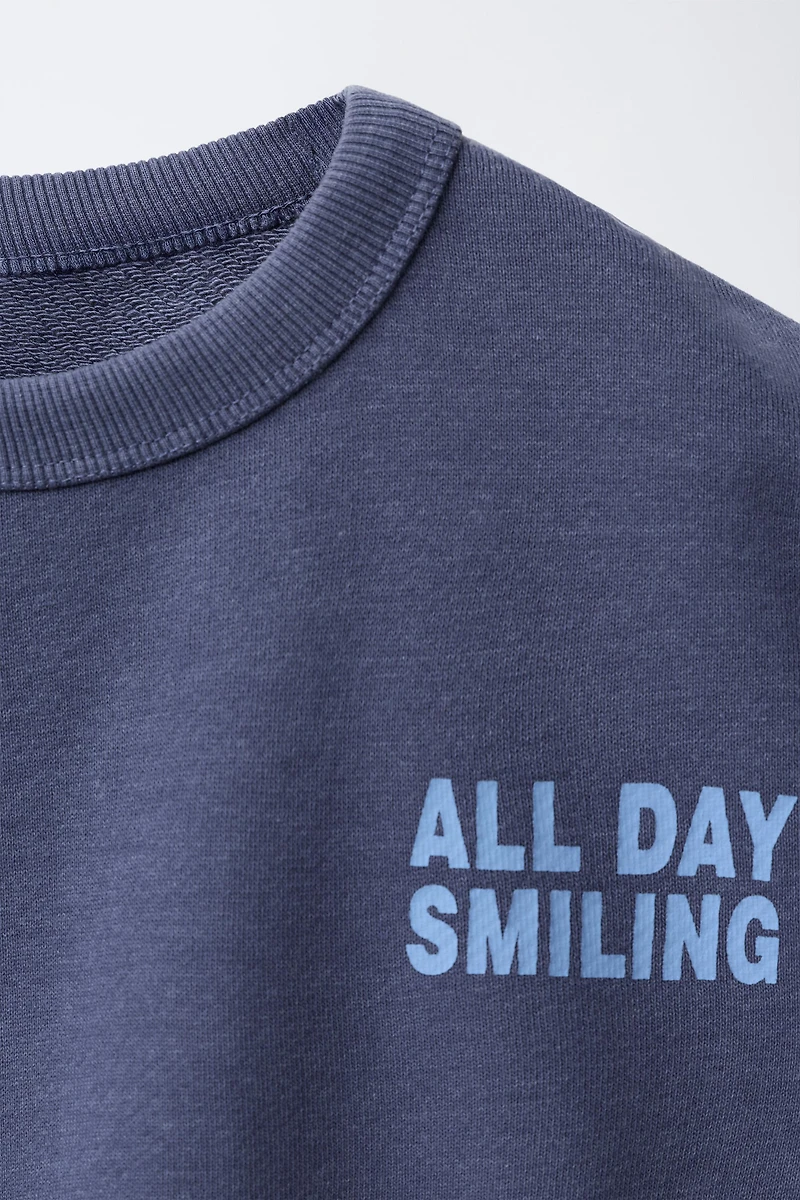 SWEAT AVEC INSCRIPTION IMPRIMÉE