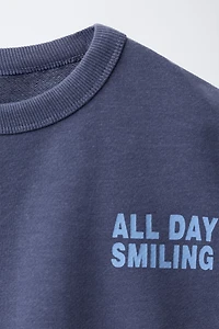 SWEAT AVEC INSCRIPTION IMPRIMÉE