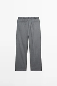 Pantalon relaxed fit à pinces en laine froide