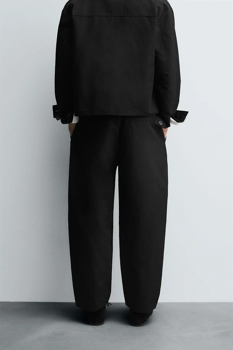 RELAXED FIT PLEATED PANTS