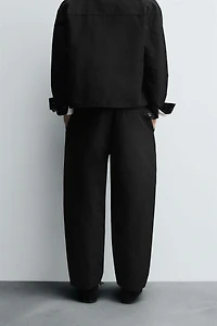 RELAXED FIT PLEATED PANTS