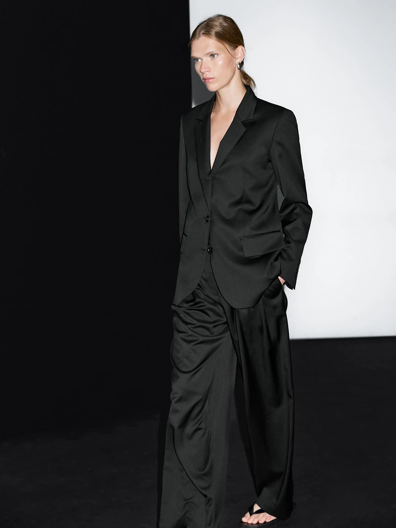 100% extra fine wool pleated trousers