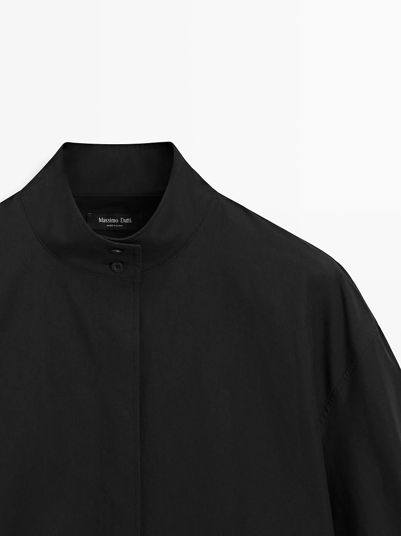 High neck shirt with strap detail
