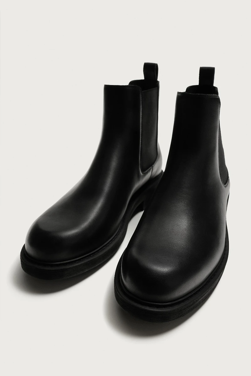 TRACK SOLE CHELSEA BOOTS