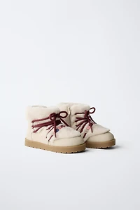 BOTTES À FANTAISIE EFFET FOURRURE