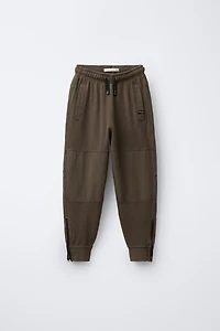 PANTALON SLIM À ZIPS