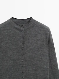 Mock turtleneck cardigan with covered buttons